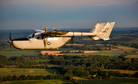 O-2A Air to Air by Mike Shore